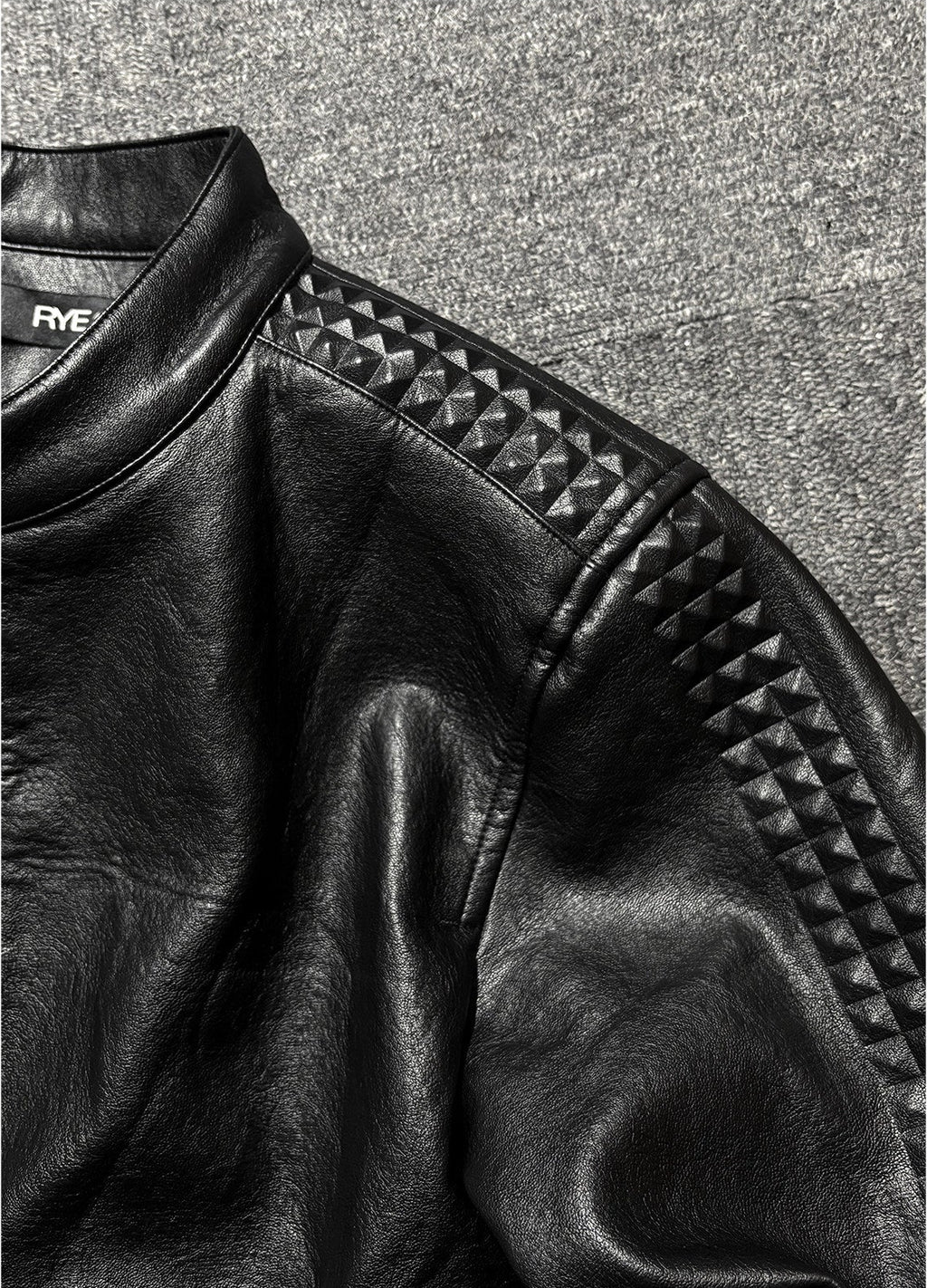 *RYE CHASIN NYFW RUNWAY COLLECTION 3D ROCK STUDDED SLIM-FIT CROPPED LEATHER JACKET