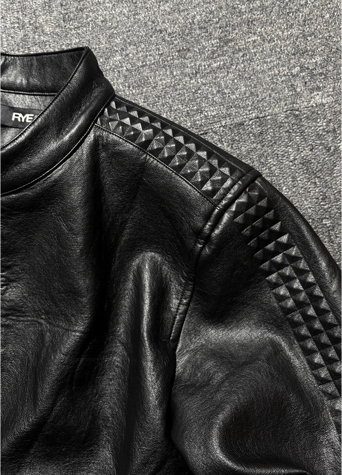 *RYE CHASIN NYFW RUNWAY COLLECTION 3D ROCK STUDDED SLIM-FIT CROPPED LEATHER JACKET